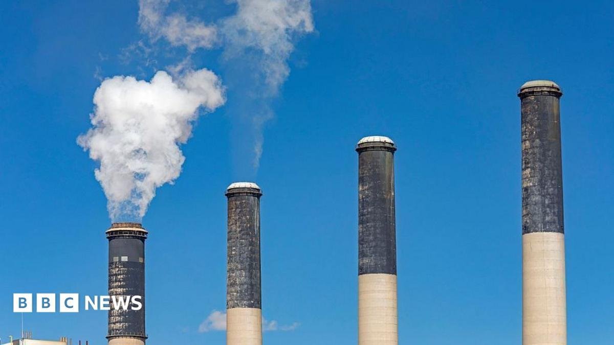 US scraps limits on emissions...
