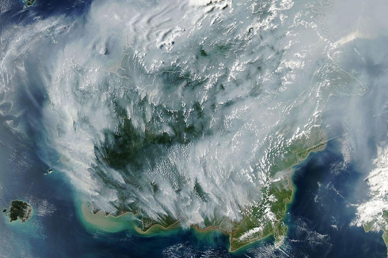 Peatland Fires Darken Skies in...