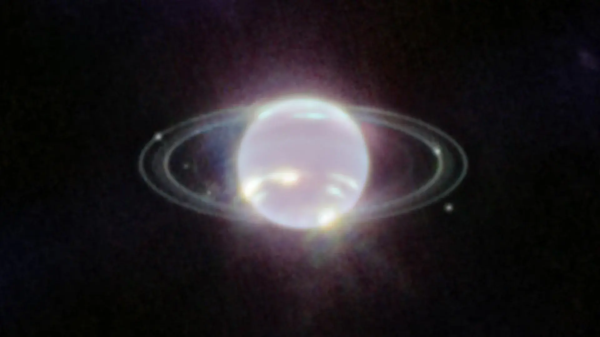 Neptune’s tiny moons may be th...