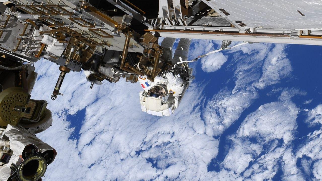 Repairing the ISS 250 miles ab...
