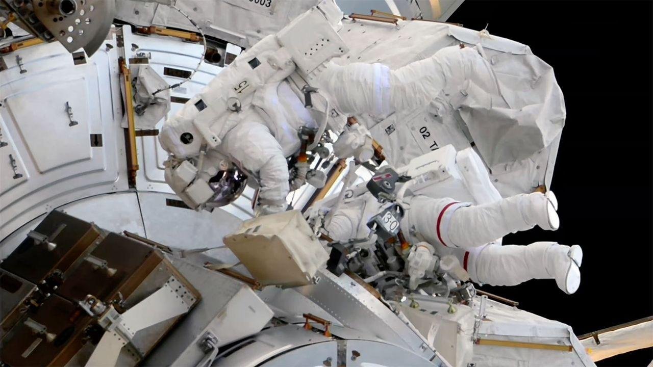 Two astronauts replace ISS cam...