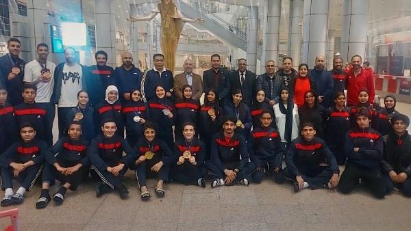 الرياضة تستقبل أبطال الكاراتيه بعد عودتهم من بولندا بـ11 ميدالية عالمية