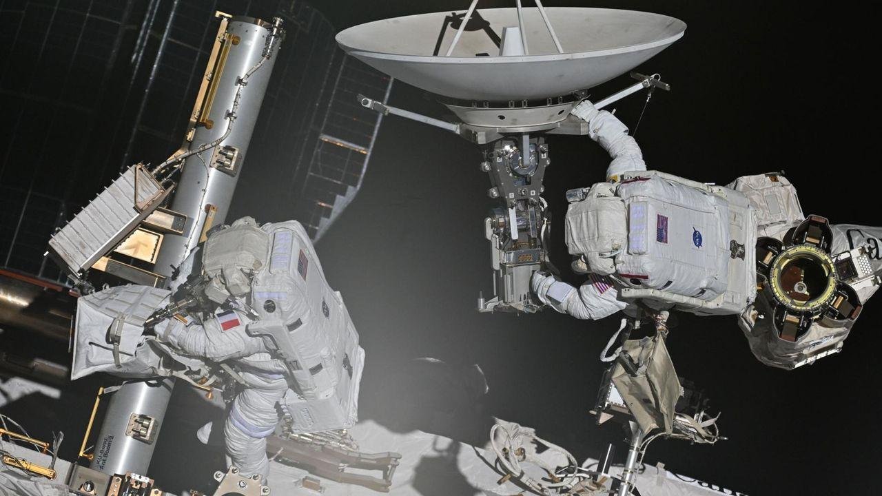 Astronauts make history repair...