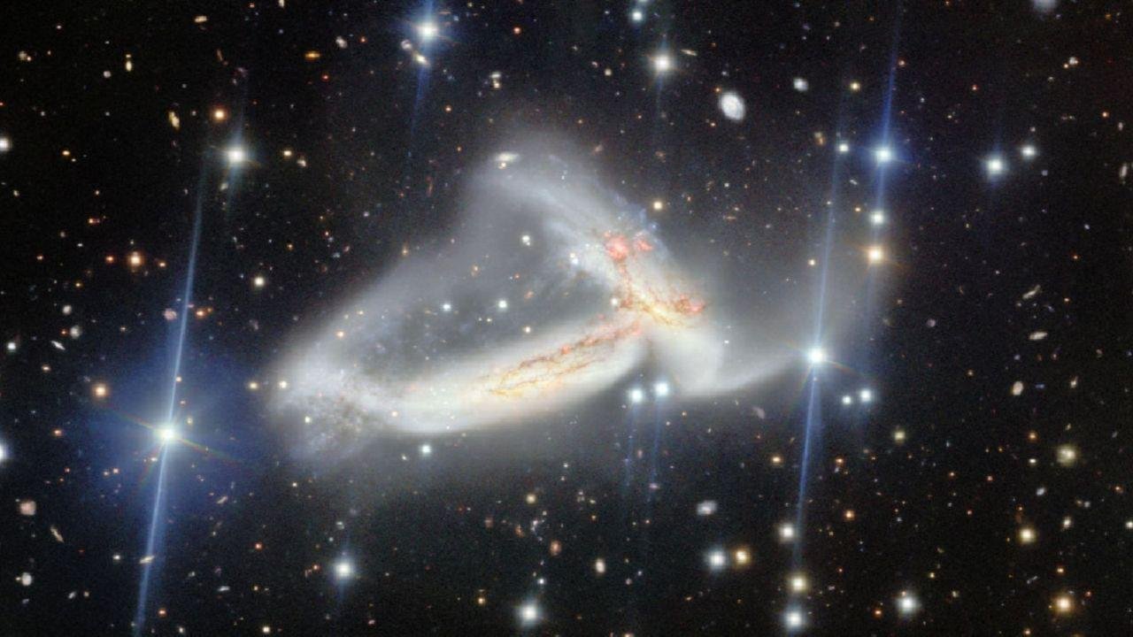 Galaxies tangled in science an...